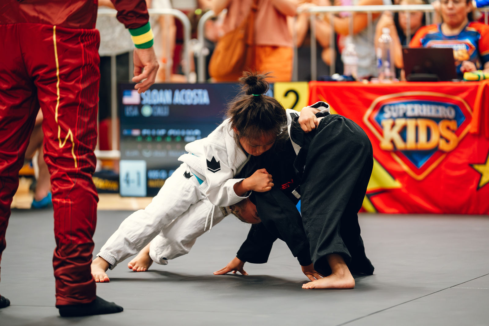 Two young athletes battling for guard position